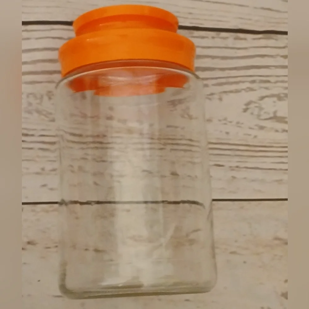 Vintage 1970s Glass Tang Jar with Orange Lid Wheel